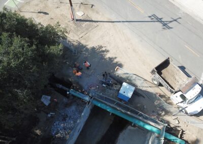 20″ steel casing housing the 10″ DI waterline pipe